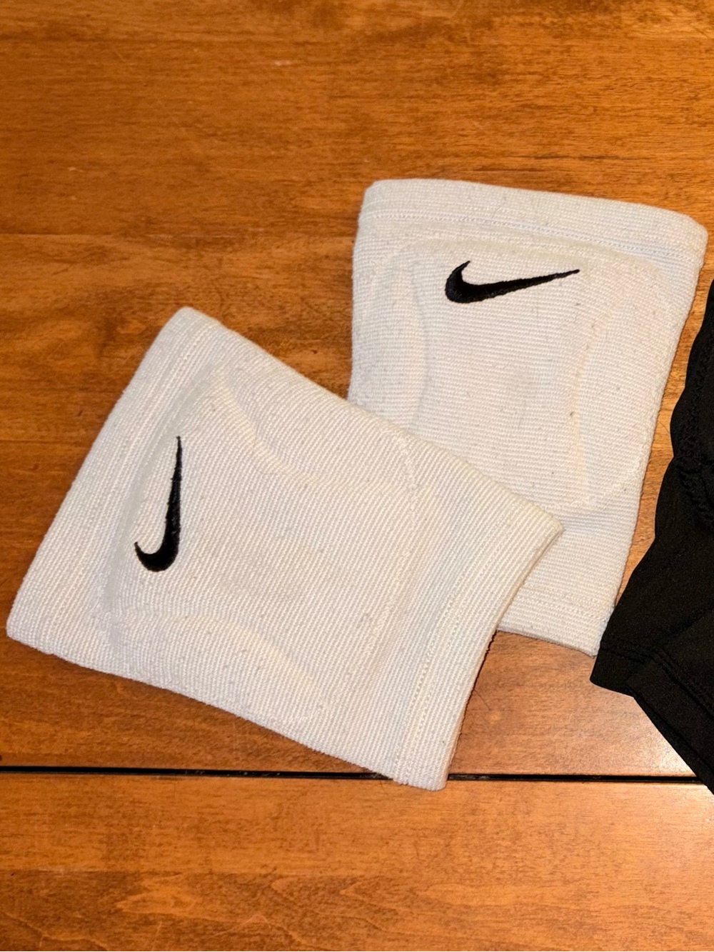 Nike White Wrist Sweatbands with Black Swoosh Logo